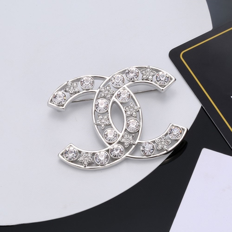 Ch*el brooches